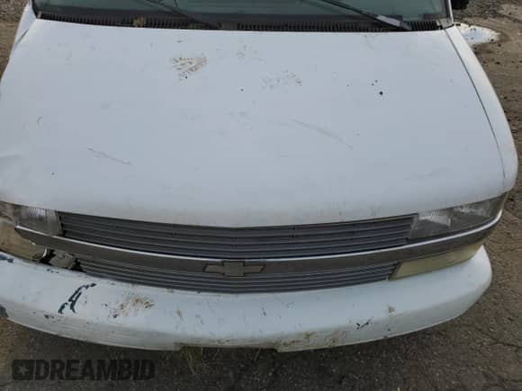 2000 Chevrolet Astro с VIN 1GNDM19W4YB137744, выставлен на аукционе Copart как лот 86167274 с пробегом Не указан миль и Списание • Salvage title. История ставок и продаж доступна на DreamBid. Изображение 13.