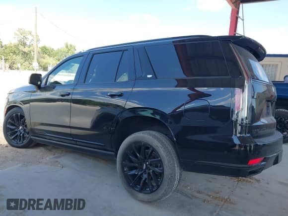 2021 Cadillac Escalade Sport z VIN 1GYS3FKL3MR216155, wystawiony jako IAAI lot #42049587 z przebiegiem 84 000 mil mil oraz . Historia ofert i sprzedaży dostępna na DreamBid. Obrazek 14.