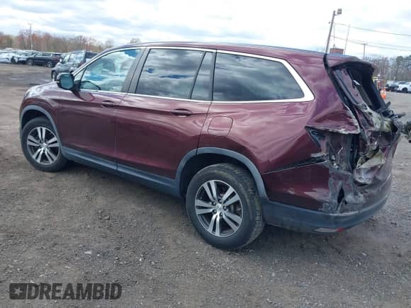 2017 Honda Pilot EX-L with VIN 5FNYF6H74HB040889, listed as a IAAI auction lot 42040094 with 84,001 mi miles and . Bid and sale history available at DreamBid. Image 3.
