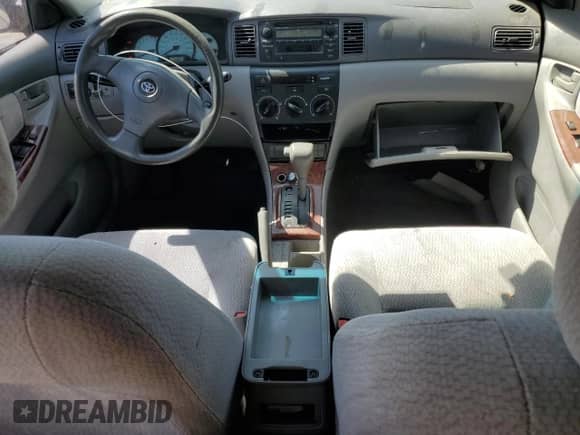 2003 Toyota Corolla CE с VIN 1NXBR32E73Z008372, выставлен на аукционе Copart как лот 80154695 с пробегом 292 811 миль миль и Списание • Salvage title. История ставок и продаж доступна на DreamBid. Изображение 8.