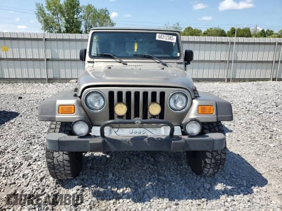 2006 Jeep Wrangler SE z VIN 1J4FA29S06P701557, wystawiony jako Copart lot #68312385 z przebiegiem 117 383 mil mil oraz Szkoda całkowita • Salvage title. Historia ofert i sprzedaży dostępna na DreamBid. Obrazek 5.