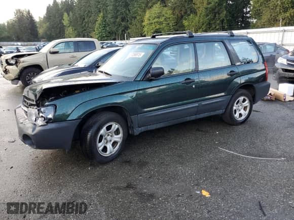 2004 Subaru Forester X with VIN JF1SG63694H724743, listed as a Copart auction lot 87098815 with 120,127 mi miles and Salvage title. Bid and sale history available at DreamBid. Image 1.