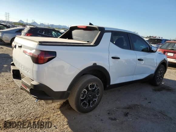 2024 Hyundai Santa Cruz SEL с VIN 5NTJB4DE8RH113577, выставлен на аукционе Copart как лот 76414904 с пробегом 8 927 миль миль и Списание • Salvage title. История ставок и продаж доступна на DreamBid. Изображение 3.