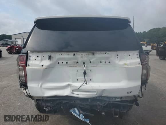 2022 Chevrolet Suburban LT с VIN 1GNSKCKD9NR304796, выставлен на аукционе Copart как лот 63745015 с пробегом 81 685 миль миль и Списание • Salvage title. История ставок и продаж доступна на DreamBid. Изображение 6.