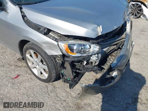 2016 Volvo S60 T5 Drive-E Premier z VIN YV126MFK3G2392066, wystawiony jako IAAI lot #42210232 z przebiegiem 80 097 mil mil oraz . Historia ofert i sprzedaży dostępna na DreamBid. Obrazek 17.