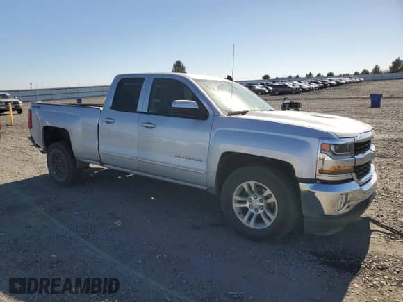 2017 Chevrolet Silverado 1500 LT with VIN 1GCVKREC9HZ210532, listed as a Copart auction lot 82233285 with 125,789 mi miles and Salvage title. Bid and sale history available at DreamBid. Image 4.
