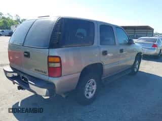 2001 Chevrolet Tahoe Special Service z VIN 1GNEC13VX1J241979, wystawiony jako IAAI lot #42025652 z przebiegiem 147 593 mil mil oraz . Historia ofert i sprzedaży dostępna na DreamBid. Obrazek 4.
