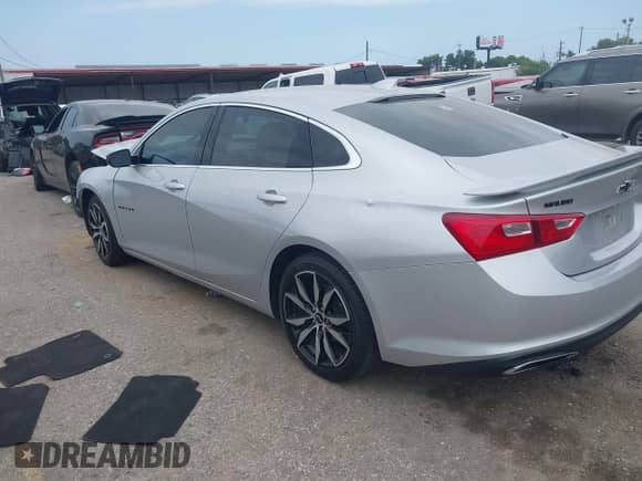 2020 Chevrolet Malibu RS with VIN 1G1ZG5ST5LF131362, listed as a IAAI auction lot 42890570 with 57,790 mi miles and . Bid and sale history available at DreamBid. Image 3.