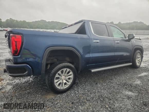 2023 GMC Sierra 1500 Denali z VIN 1GTUUGED9PZ137390, wystawiony jako Copart lot #67752445 z przebiegiem 37 436 mil mil oraz Szkoda całkowita • Salvage title. Historia ofert i sprzedaży dostępna na DreamBid. Obrazek 3.