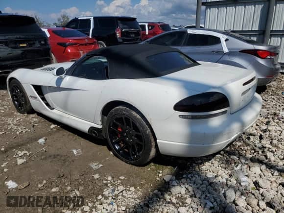 2004 Dodge Viper SRT-10 with VIN 1B3JZ65Z64V101042, listed as a Copart auction lot 73650684 with 27,753 mi miles and Salvage title. Bid and sale history available at DreamBid. Image 2.