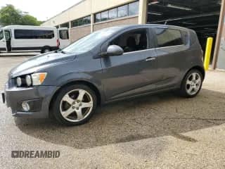 2013 Chevrolet Sonic LTZ with VIN 1G1JE6SB0D4104549, listed as a Copart auction lot 82157005 with 195,547 mi miles and Clean title. Bid and sale history available at DreamBid. Image 1.