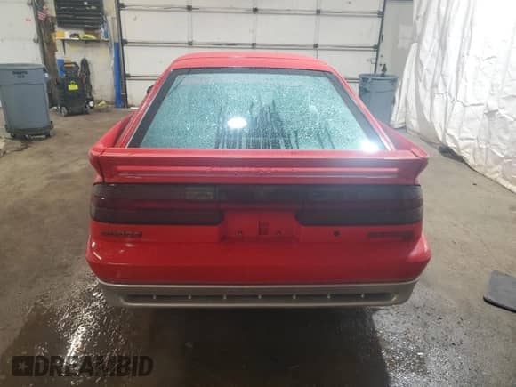 1990 Dodge Daytona with VIN 1B3XG44K3LG494199, listed as a Copart auction lot 60997765 with 68,533 mi miles and Salvage title. Bid and sale history available at DreamBid. Image 6.
