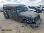 2024 Jeep Wrangler Sport S z VIN 1C4PJXDN8RW104028, wystawiony jako Copart lot #68774915 z przebiegiem 23 946 mil mil oraz Szkoda całkowita • Salvage title. Historia ofert i sprzedaży dostępna na DreamBid. Obrazek 4.