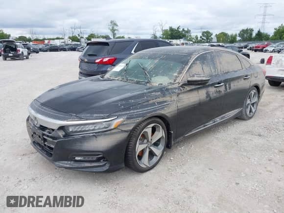 2019 Honda Accord Touring with VIN 1HGCV2F90KA012213, listed as a IAAI auction lot 43024723 with Not provided miles and . Bid and sale history available at DreamBid. Image 2.
