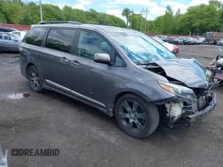 2015 Toyota Sienna SE with VIN 5TDXK3DC2FS559232, listed as a IAAI auction lot 42341965 with 130,732 mi miles and . Bid and sale history available at DreamBid. Image 1.