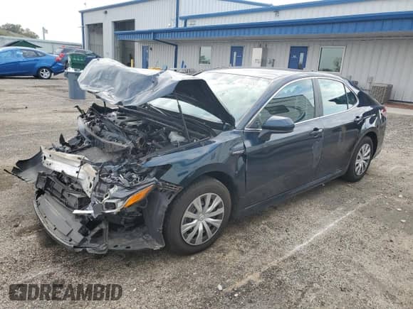 2019 Toyota Camry Hybrid LE с VIN 4T1B31HK1KU509422, выставлен на аукционе Copart как лот 86729355 с пробегом 63 027 миль миль и Списание • Salvage title. История ставок и продаж доступна на DreamBid. Изображение 1.