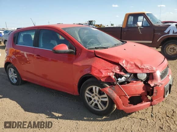 2012 Chevrolet Sonic LT z VIN 1G1JD6SH6C4219209, wystawiony jako Copart lot #69322235 z przebiegiem 117 578 mil mil oraz Szkoda całkowita • Salvage title. Historia ofert i sprzedaży dostępna na DreamBid. Obrazek 4.