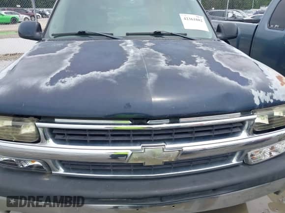2005 Chevrolet Tahoe LT z VIN 1GNEC13T85J189000, wystawiony jako IAAI lot #42361882 z przebiegiem 212 074 mil mil oraz . Historia ofert i sprzedaży dostępna na DreamBid. Obrazek 6.