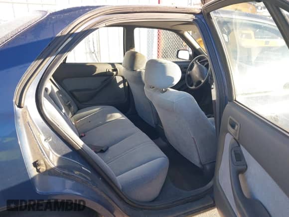 1994 Toyota Camry LE z VIN 4T1SK12EXRU374215, wystawiony jako IAAI lot #41581093 z przebiegiem 80 397 mil mil oraz . Historia ofert i sprzedaży dostępna na DreamBid. Obrazek 8.