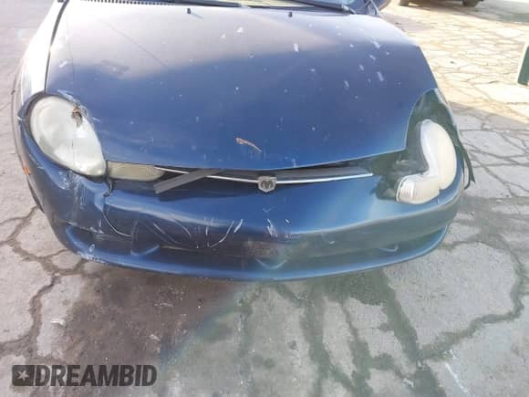 2000 Dodge Neon Highline z VIN 1B3ES46C9YD798867, wystawiony jako IAAI lot #41535717 z przebiegiem 175 069 mil mil oraz . Historia ofert i sprzedaży dostępna na DreamBid. Obrazek 6.