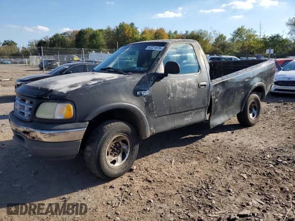 2002 Ford F-150 XL с VIN 1FTRF18202NB70186, выставлен на аукционе Copart как лот 82221575 с пробегом Не указан миль и Списание • Salvage title. История ставок и продаж доступна на DreamBid. Изображение 1.