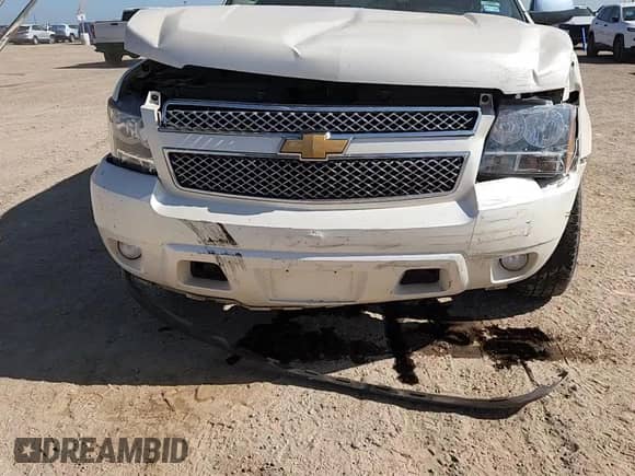 2013 Chevrolet Tahoe LTZ с VIN 1GNSCCE05DR110058, выставлен на аукционе Copart как лот 61679245 с пробегом 230 594 миль миль и Списание • Salvage title. История ставок и продаж доступна на DreamBid. Изображение 14.