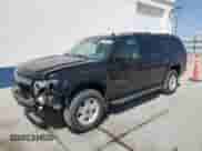 2009 Chevrolet Suburban 2LT with VIN 1GNFK26399R300007, listed as a Copart auction lot 61559815 with 195,033 mi miles and Salvage title. Bid and sale history available at DreamBid. Image 1.