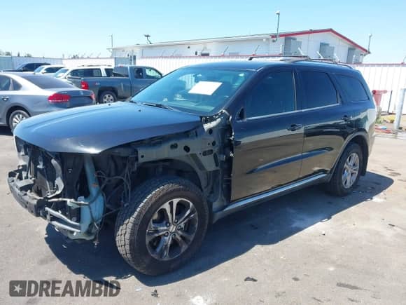 2012 Dodge Durango Crew with VIN 1C4SDJDT8CC205088, listed as a IAAI auction lot 42736638 with 189,387 mi miles and . Bid and sale history available at DreamBid. Image 19.