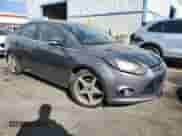 2014 Ford Focus Titanium with VIN 1FADP3J21EL300155, listed as a Copart auction lot 45367095 with 100,721 mi miles and Clean title. Bid and sale history available at DreamBid. Image 4.