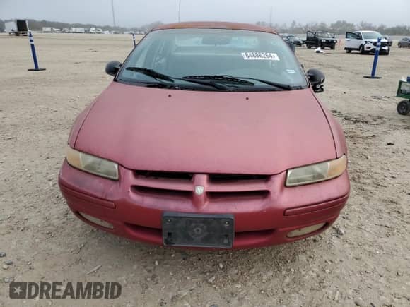 1998 Dodge Stratus ES with VIN 1B3EJ56H6WN168171, listed as a Copart auction lot 84886264 with 86,418 mi miles and Clean title. Bid and sale history available at DreamBid. Image 5.
