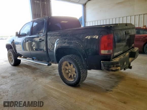 2013 GMC Sierra 1500 SLT с VIN 3GTP2WE74DG213892, выставлен на аукционе Copart как лот 60900705 с пробегом 202 145 миль миль и Чистый • Clean title. История ставок и продаж доступна на DreamBid. Изображение 2.