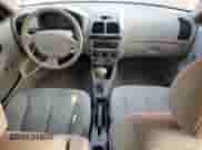 2005 Hyundai Accent GLS с VIN KMHCG45C15U596671, выставлен на аукционе Copart как лот 74834004 с пробегом Не указан миль и Списание • Salvage title. История ставок и продаж доступна на DreamBid. Изображение 8.