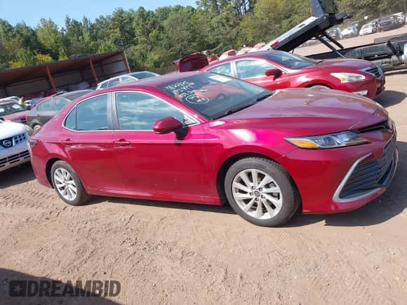 2021 Toyota Camry LE z VIN 4T1C11AK0MU526459, wystawiony jako IAAI lot #43148735 z przebiegiem 89 112 mil mil oraz . Historia ofert i sprzedaży dostępna na DreamBid. Obrazek 13.