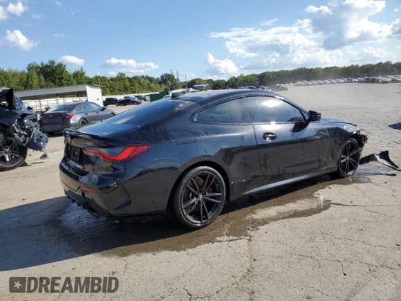 2023 BMW 4 Series 430i xDrive with VIN WBA73AP02PCL47210, listed as a Copart auction lot 72401194 with 27,518 mi miles and Salvage title. Bid and sale history available at DreamBid. Image 3.