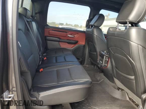 2021 Ram 1500 Rebel z VIN 1C6SRFLT0MN797874, wystawiony jako Copart lot #85874135 z przebiegiem 67 416 mil mil oraz Czysty tytuł • Clean title. Historia ofert i sprzedaży dostępna na DreamBid. Obrazek 10.