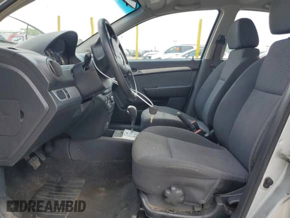 2011 Chevrolet Aveo 1LT with VIN KL1TD5DE4BB229302, listed as a Copart auction lot 66280195 with 144,467 mi miles and Salvage title. Bid and sale history available at DreamBid. Image 7.