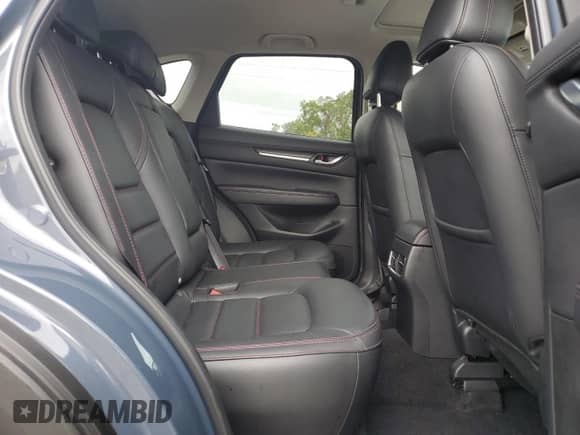 2024 Mazda CX-5 S Carbon Edition z VIN JM3KFBCL7R0521388, wystawiony jako Copart lot #84394325 z przebiegiem 17 806 mil mil oraz Szkoda całkowita • Salvage title. Historia ofert i sprzedaży dostępna na DreamBid. Obrazek 11.