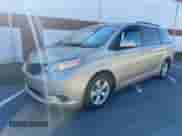 2012 Toyota Sienna LE AAS with VIN 5TDKK3DC9CS233451, listed as a Copart auction lot 87127545 with 220,725 mi miles and Clean title. Bid and sale history available at DreamBid. Image 2.