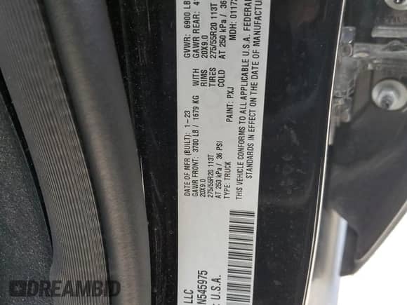 2023 Ram 1500 Big Horn z VIN 1C6RREFG2PN545975, wystawiony jako Copart lot #70820004 z przebiegiem 29 992 mil mil oraz Szkoda całkowita • Salvage title. Historia ofert i sprzedaży dostępna na DreamBid. Obrazek 13.