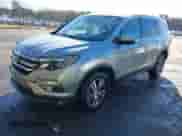 2017 Honda Pilot EX with VIN 5FNYF6H43HB105219, listed as a IAAI auction lot 41206317 with 104,839 mi miles and . Bid and sale history available at DreamBid. Image 2.