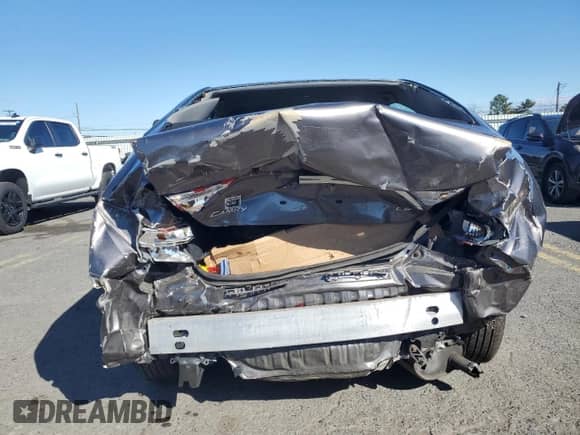 2015 Toyota Camry LE z VIN 4T4BF1FK6FR451815, wystawiony jako Copart lot #82371635 z przebiegiem Nie podano mil oraz Szkoda całkowita • Salvage title. Historia ofert i sprzedaży dostępna na DreamBid. Obrazek 6.