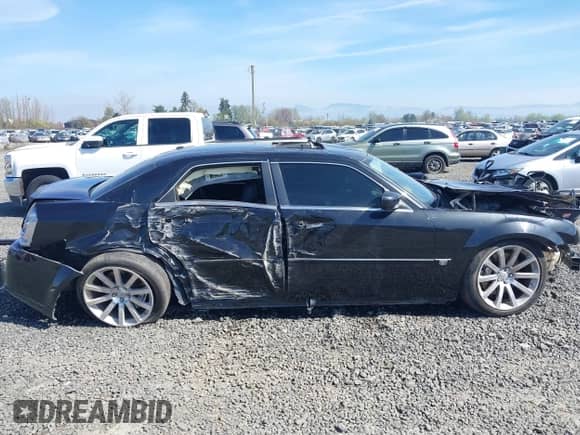 2006 Chrysler 300 C SRT-8 with VIN 2C3LA73W36H509656, listed as a IAAI auction lot 41852179 with 92,209 mi miles and . Bid and sale history available at DreamBid. Image 14.