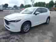 2024 Mazda CX-5 S Preferred z VIN JM3KFBCL3R0456491, wystawiony jako IAAI lot #43289902 z przebiegiem 20 370 mil mil oraz . Historia ofert i sprzedaży dostępna na DreamBid. Obrazek 2.