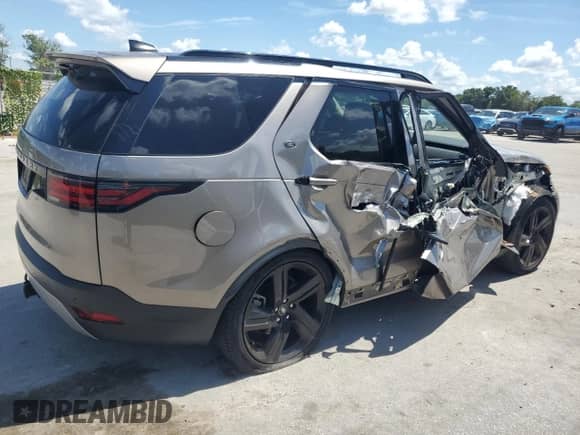 2023 Land Rover Discovery S с VIN SALRJ2EXXP2465558, выставлен на аукционе Copart как лот 62910124 с пробегом Не указан миль и Списание • Salvage title. История ставок и продаж доступна на DreamBid. Изображение 3.