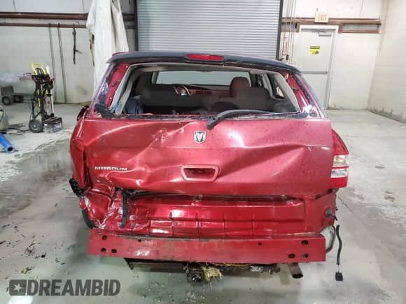 2007 Dodge Magnum with VIN 2D4FV47T47H701989, listed as a Copart auction lot 71868053 with 117,909 mi miles and Salvage title. Bid and sale history available at DreamBid. Image 6.