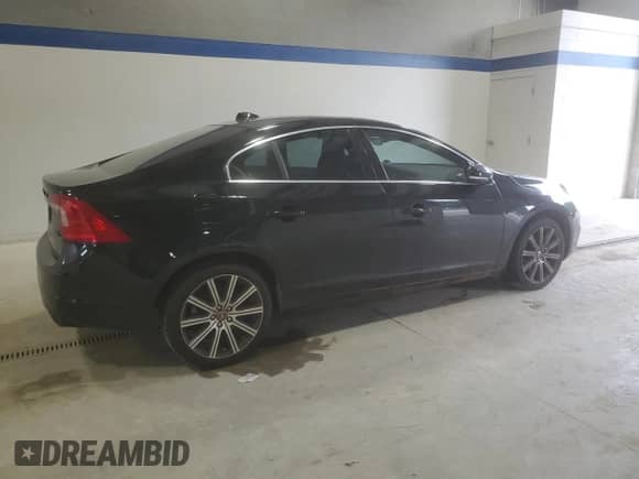 2015 Volvo S60 T6 Drive-E with VIN YV149MFK2F2351331, listed as a Copart auction lot 69287175 with 126,628 mi miles and Salvage title. Bid and sale history available at DreamBid. Image 3.