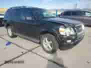 2009 Ford Explorer XLT with VIN 1FMEU63E89UA17960, listed as a Copart auction lot 65979265 with 163,788 mi miles and Salvage title. Bid and sale history available at DreamBid. Image 4.