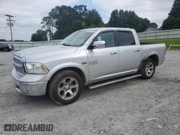 2014 Ram 1500 Laramie z VIN 1C6RR7NT7ES374567, wystawiony jako Copart lot #69382485 z przebiegiem 153 374 mil mil oraz Szkoda całkowita • Salvage title. Historia ofert i sprzedaży dostępna na DreamBid. Obrazek 1.
