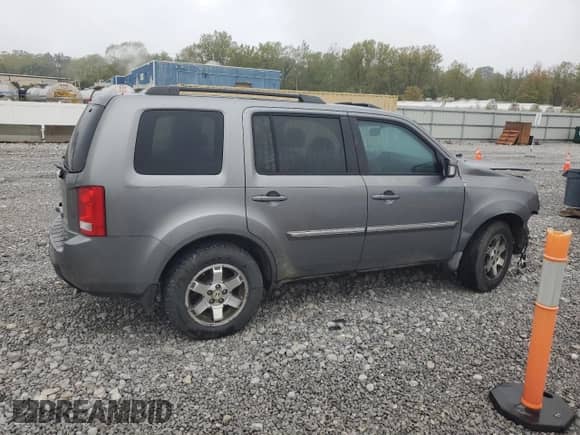 2009 Honda Pilot Touring with VIN 5FNYF38879B002632, listed as a Copart auction lot 82134795 with Not provided miles and Salvage title. Bid and sale history available at DreamBid. Image 3.