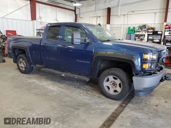 2015 Chevrolet Silverado 1500 LS with VIN 1GCVKPEC7FZ447151, listed as a Copart auction lot 61237105 with 165,848 mi miles and Non repairable. Bid and sale history available at DreamBid. Image 4.